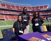 FLY Staff at a community partner event